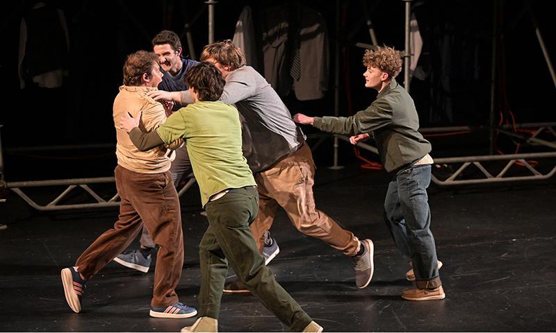 a group of men on a stage